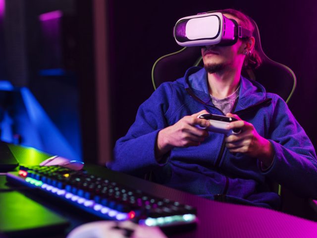 medium-shot-gamer-sitting-chair